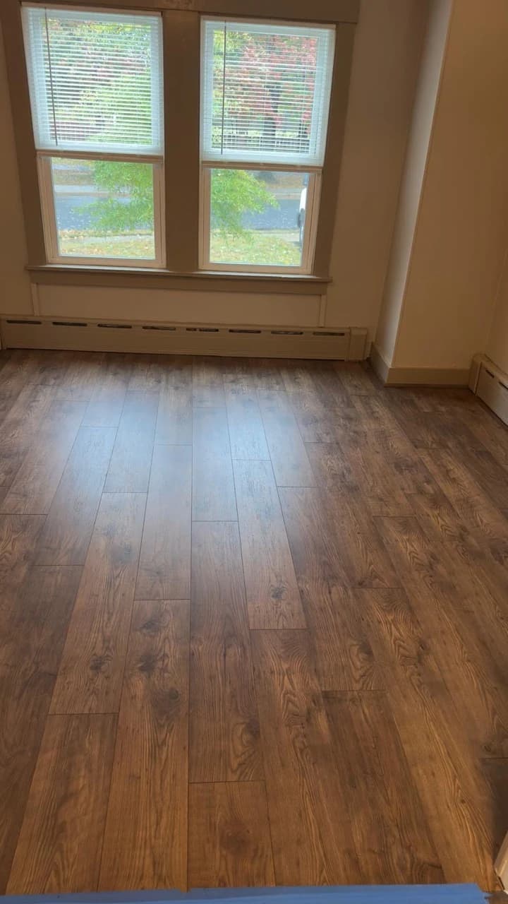 Rustic brown plank flooring with visible grain patterns