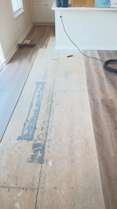 Floor preparation and installation details in a residential interior — work in progress