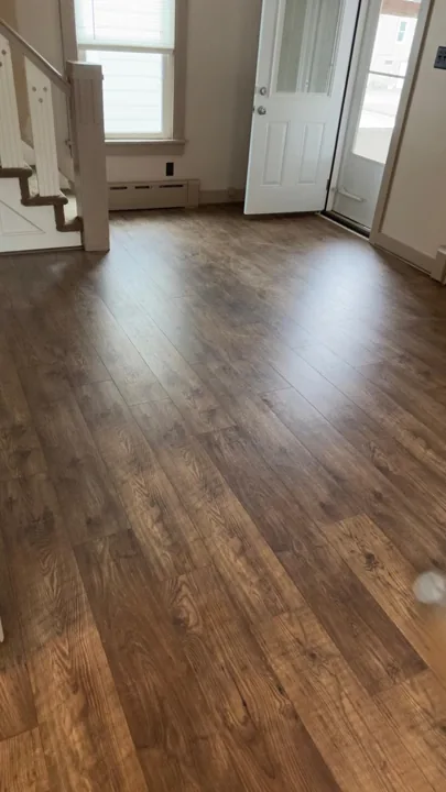 Rustic brown plank flooring with visible grain patterns