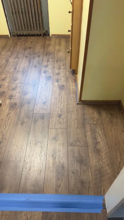 Rustic brown plank flooring with visible grain patterns