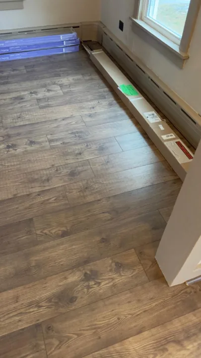 Rustic brown plank flooring with visible grain patterns