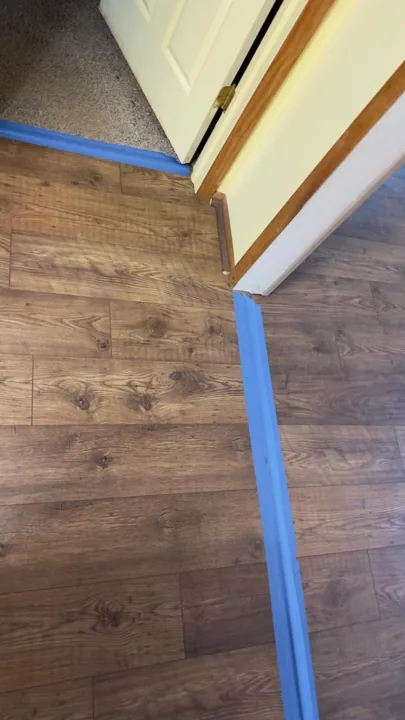 Rustic brown plank flooring with visible grain patterns