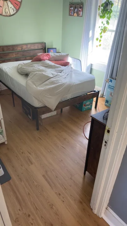 Warm wood-look flooring around dining furniture