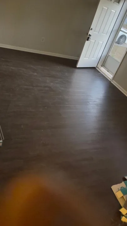 Dark brown plank flooring and installation details