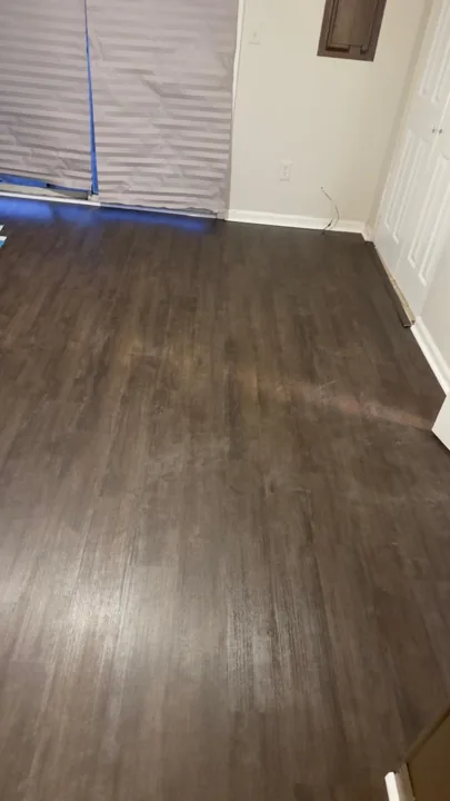Dark brown plank flooring and installation details