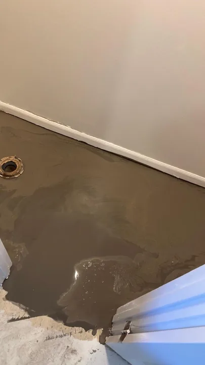 Dark brown plank flooring and installation details — work in progress