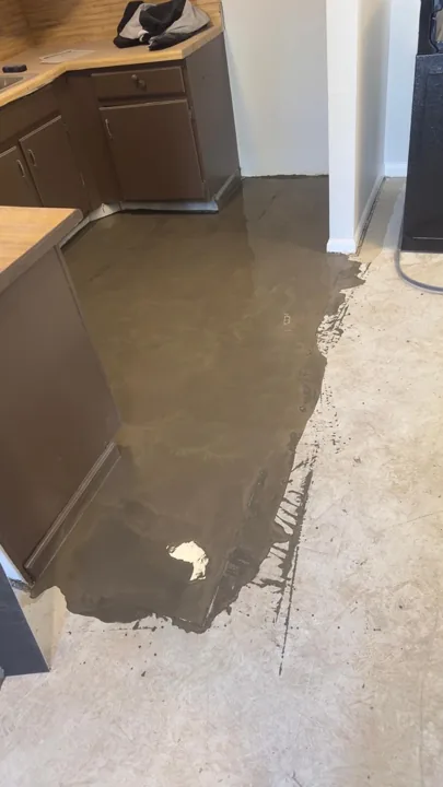 Dark brown plank flooring and installation details — work in progress