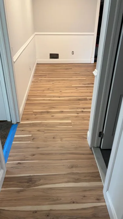 Variegated brown and cream plank flooring